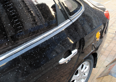 车漆上的喷漆怎么去除