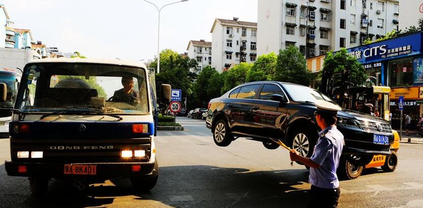 北京拟出台最严交规治理乱停车违章，罚款200元扣3分，还可能拖车！